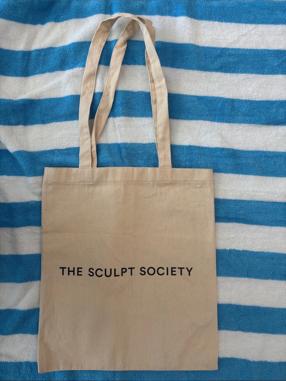 New The Sculpt Society tote bag in cream & navy blue